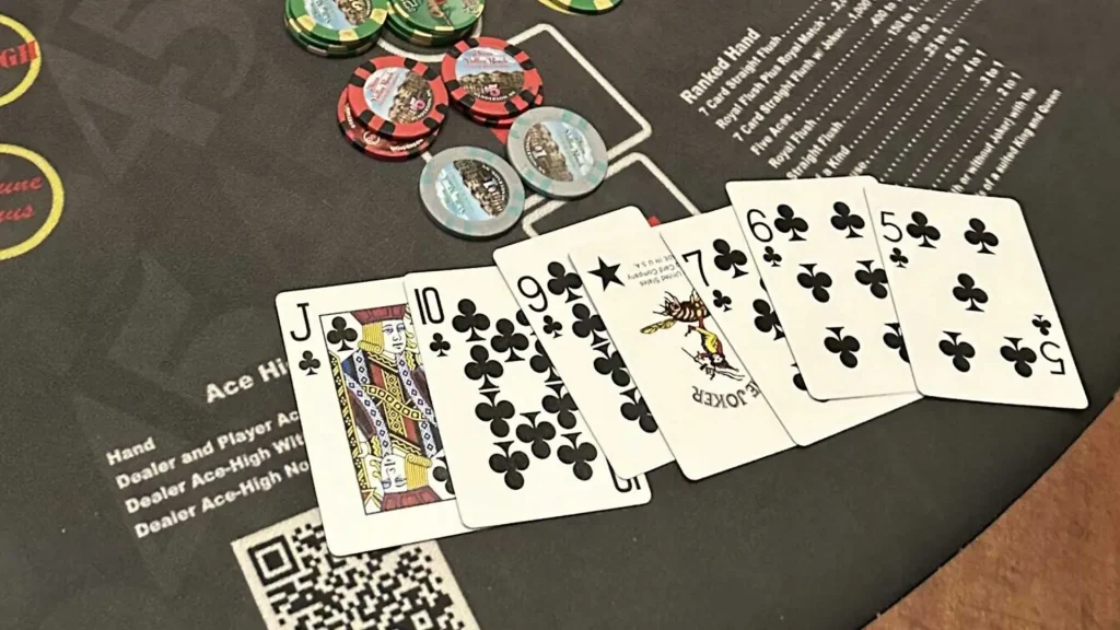 7-Card-Straight Flush Pai Gow poker hand with Joker